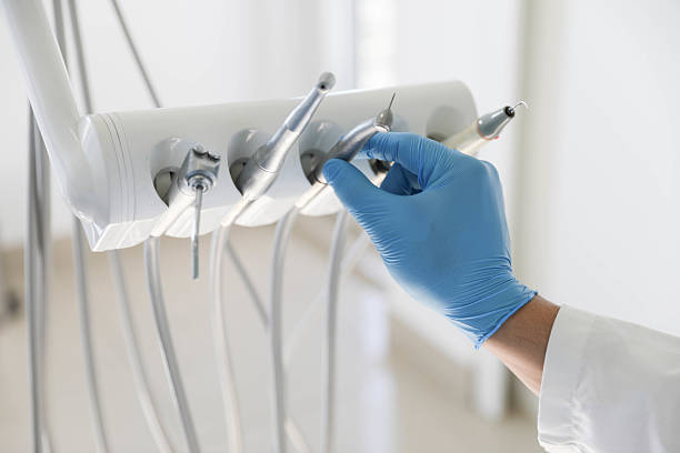 Professional Tooth Extraction technician working in Byng, OK